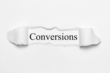 Conversions on white torn paper