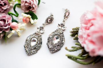 Beautiful vintage earrings on white background
