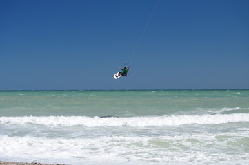 kite surf,jump,sport,wind,sea,sky,horizon,blue,water,kite,summer