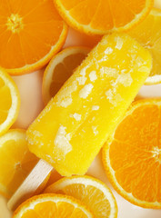 Fototapeta na wymiar Homemade orange and lemon popsicle