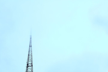 Television tower against blue sky with copy space