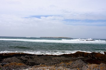 Fototapeta na wymiar Looking at the Atlantic Ocean from the coast of Ireland