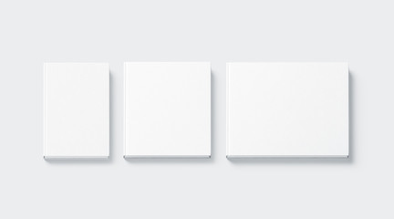 Blank white square and rectangular hardback books mock up, top view, 3d rendering. Empty notebooks hard cover mockups, isolated. Bookstore booklet branding template.