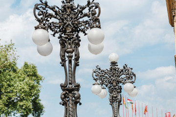 Old iron beautiful street lanterns near Royal Palace in Budapest