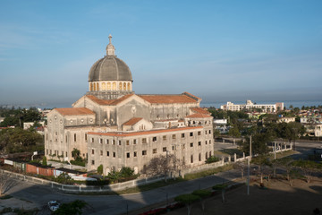 Fototapeta na wymiar Exterior of the Iglesia de Jesús de Miramar (Church of Jesus of Miramar) in Havana, Cuba in the early morning as the sun coming up. Ocean in the background.