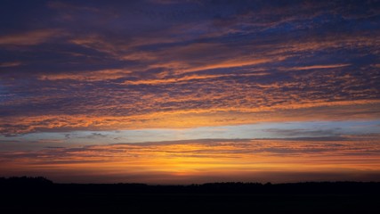 Fiery orange sunset sky . Sunset with dramatic sky background.