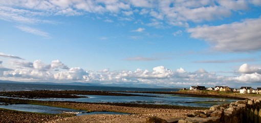 Low Tide against a blue sky