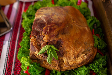 large pieces of smoked brisket meat on a wooden board