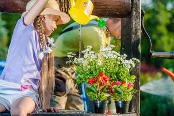 Girl Taking Care of Flowers