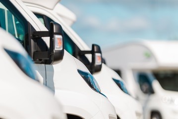 Row of Camper Vans