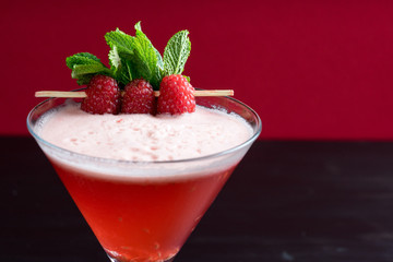 raspberry cosmopolitan martini vodka cocktail drink bar mint garnish ice bartender