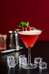 raspberry cosmopolitan martini vodka cocktail drink bar mint garnish ice bartender