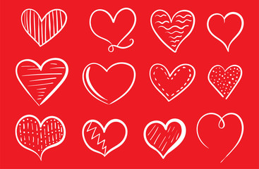 Obraz na płótnie Canvas Set of hand drawn heart. Hearts isolated on red background.