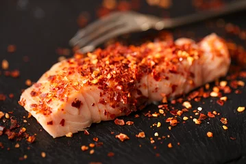 Papier Peint photo autocollant Poisson harissa spice mix - morrocan red hot chilles with king prawns