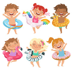 Happy childrens dressed in rubber circles. Playing games in water park