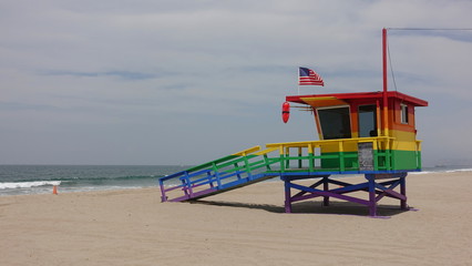 Fototapeta premium A life guard tower in Venice Beach, CA is painted in rainbow colors for LBGT Pride month