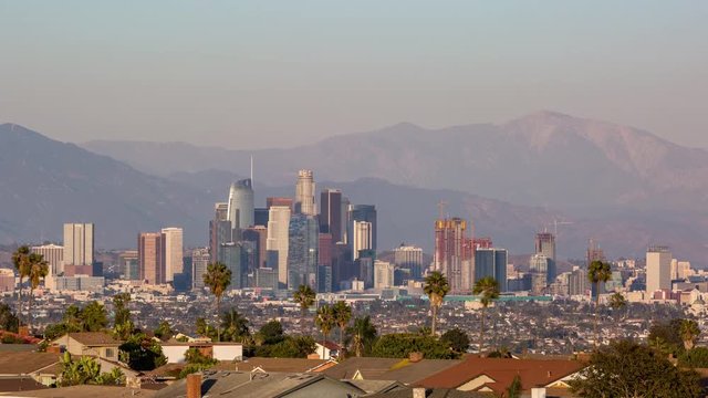 Downtown Los Angeles Skyline with Mountains Day to Night Sunset Timelapse