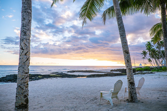 Two deck chairs at sunset on an empty beach at Lefaga, Matautu, Upolu Island, Samoa, South Pacific
