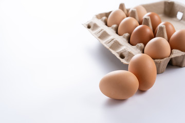 brown chicken eggs  raw chicken eggs in egg box healthy food and organic farming concept