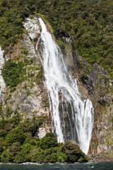 Obraz premium Waterfall at Milford Sound, Fiordland, New Zealand