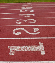 Painted numbers in lanes on a running track