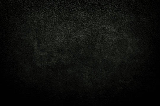 dark green leather background or texture