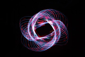 Light painting forming a dashed flower star shape - obrazy, fototapety, plakaty