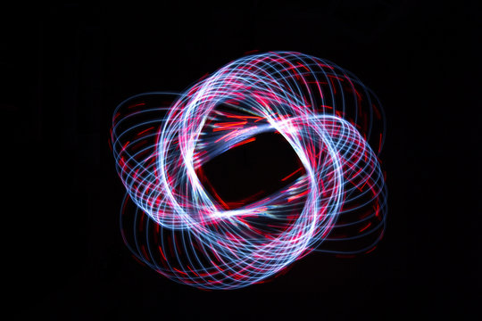 Light painting forming a dashed flower star shape