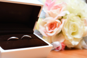 marriage ring and bridal bouquet