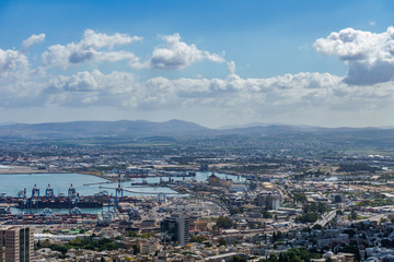 Fototapeta premium View from the top to city of Haifa in Israel and harbor at spring time.