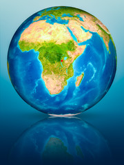 Burundi on Earth on reflective surface