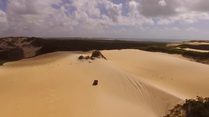 Aerial view of dune buggy car. Dunas móveis de Genipabu -  Natal, RN / Brazil