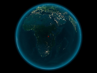 Burundi on planet Earth in space at night