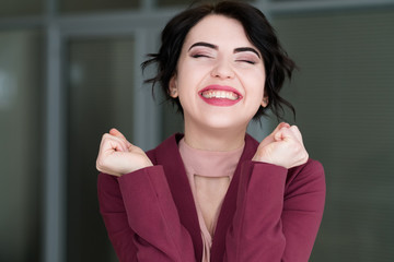 emotion face. smiling woman pleased with herself. self-satisfied young beautiful brunette girl....