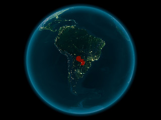 Paraguay on planet Earth in space at night