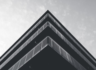 Architecture detail Modern building Facade Corner Black and White