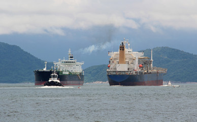Two tankers pass each other in Santos port, Brazil