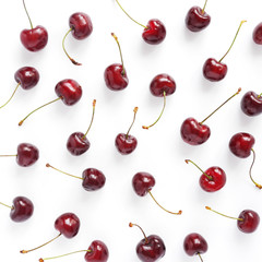 Pattern of fresh cherry isolated on a white background. top view, flat layout. Food background.