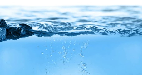 blue wave water with bubbles in tank on white background, slow motion movement, concept of clean and purity - Powered by Adobe