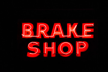 Obraz premium Red Neon Brake Shop Sign