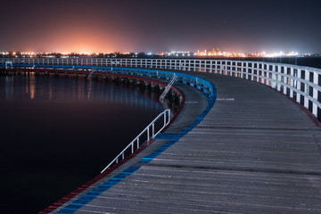 Boardwalk through water at night - Geelong Promenade