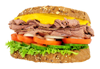 Roast beef rye bread sandwich with salad and English mustard isolated on a white background © philip kinsey