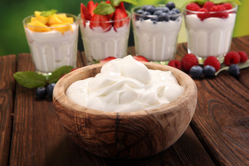 Yogurt and berry. Fresh fruit yogurt with fresh berries and peaches