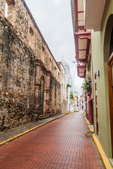 Narrow alley and ruined La Compania de Jesus church in Panama City