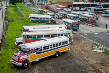 PANAMA CITY, PANAMA - MAY 30, 2016: Buses wait at Albrook Bus Terminal in Panama City.