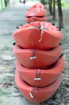 Red kayak or canue prepared for rafting