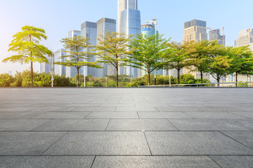 Fototapeta premium Empty square floor and modern city commercial buildings in shenzhen,China