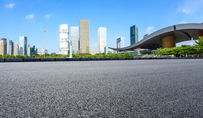 Fototapeta na wymiar Empty asphalt road and modern city commercial buildings panorama in shenzhen,China