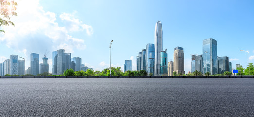 Empty asphalt road and modern city commercial buildings panorama in shenzhen,China