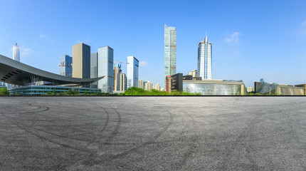 Asphalt square and modern city commercial buildings in shenzhen,China